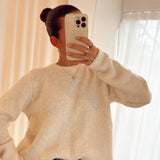 Knit with broderie/button back detail