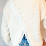 Knit with broderie/button back detail